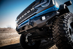 https://serenity-foxfactory.asset.akeneo.cloud/fox_asset_family/media/Blue_Bronco_CWL_Front_bumper_lights_radar_04.jpg