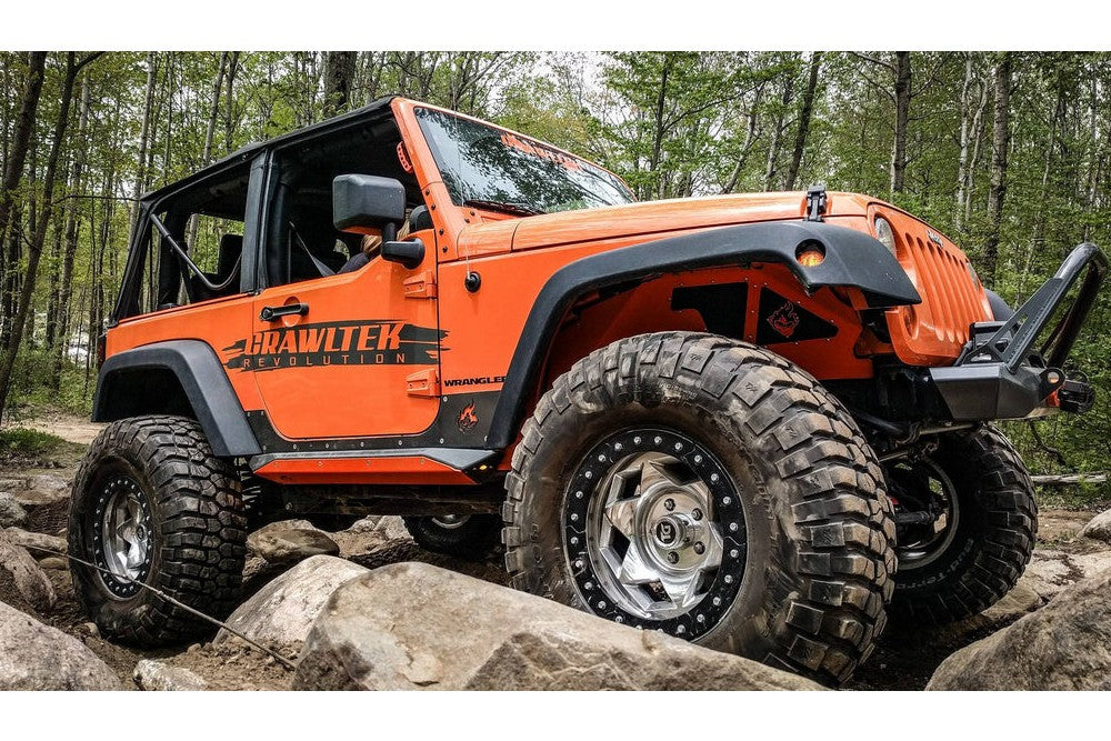 https://serenity-foxfactory.asset.akeneo.cloud/fox_asset_family/media/cwl_jk41101_lifestyle_01_jeep_jk_2dr_rocker_guard.jpg