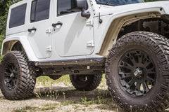 https://serenity-foxfactory.asset.akeneo.cloud/fox_asset_family/media/cwl_jk41401_lifestyle_06_jeep_jk_4dr_rocker_guard.jpg