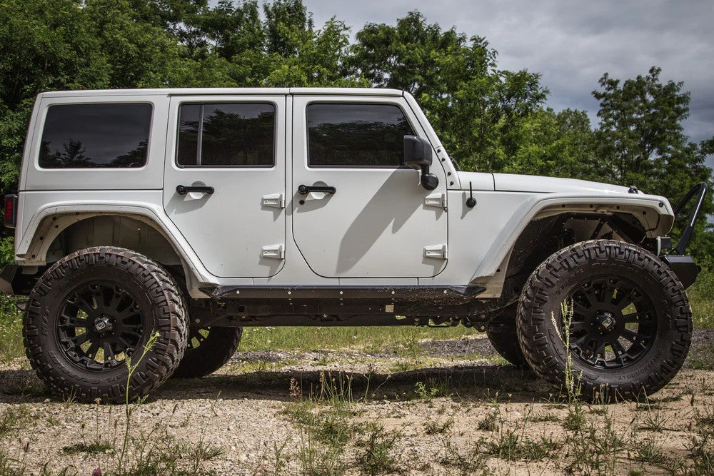 https://serenity-foxfactory.asset.akeneo.cloud/fox_asset_family/media/cwl_jk41401_lifestyle_03_jeep_jk_4dr_rocker_guard.jpg